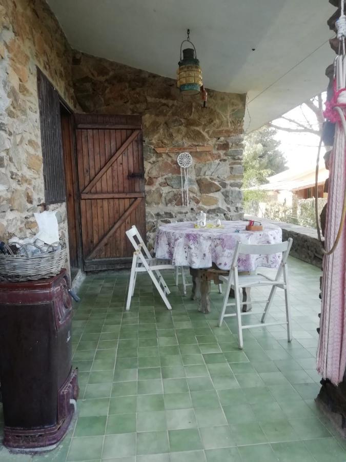 Bed and Breakfast Sa Domo De Afra Стинтино Экстерьер фото
